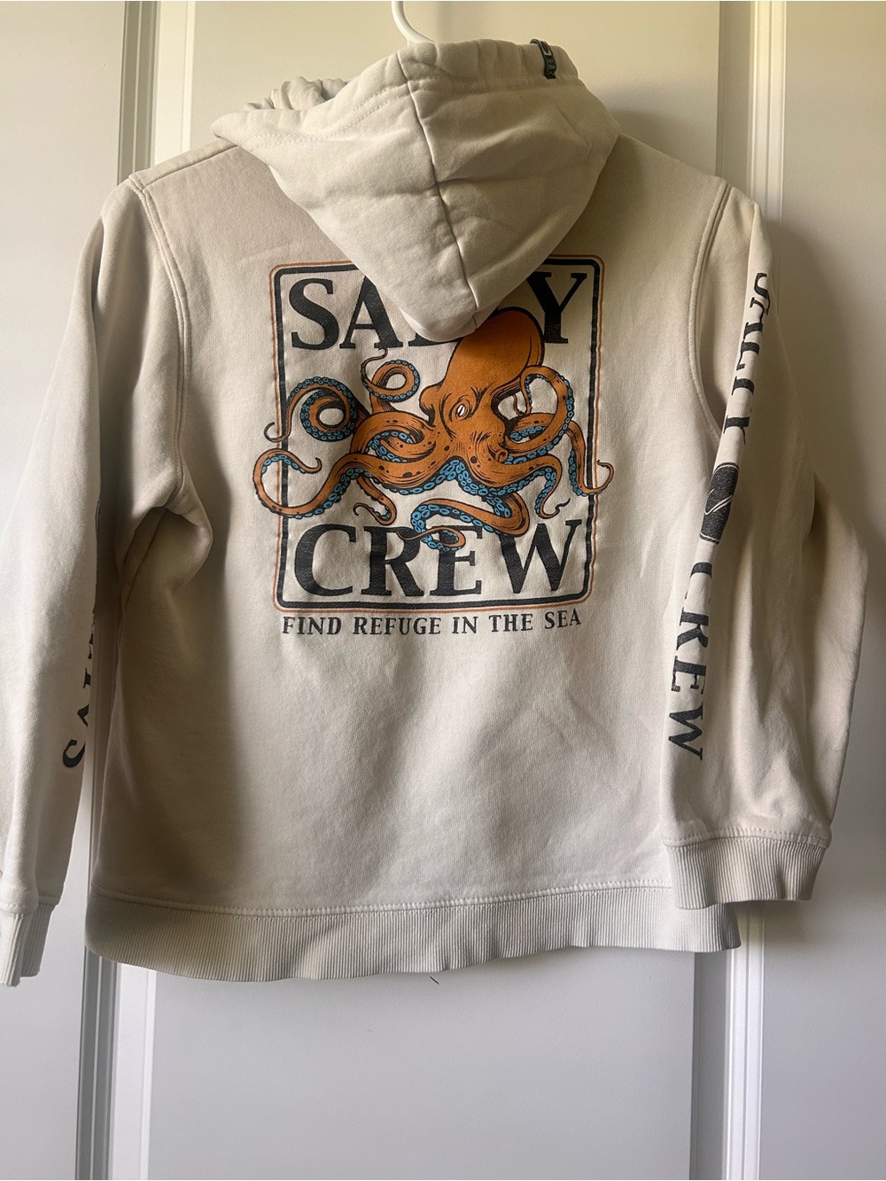 Salty Crew Cream Hoodie with Orange & Blue Octopus Graphic